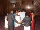 BRIDE'S CIRCLE OF LOVE:  Before the ceremony, Angela is circled by the women in her bridal party.  As she stands in the center, the Mothers of both the Bride & Groom join her with hands placed on her shoulders and are led in prayer by the Bride's Pastor.